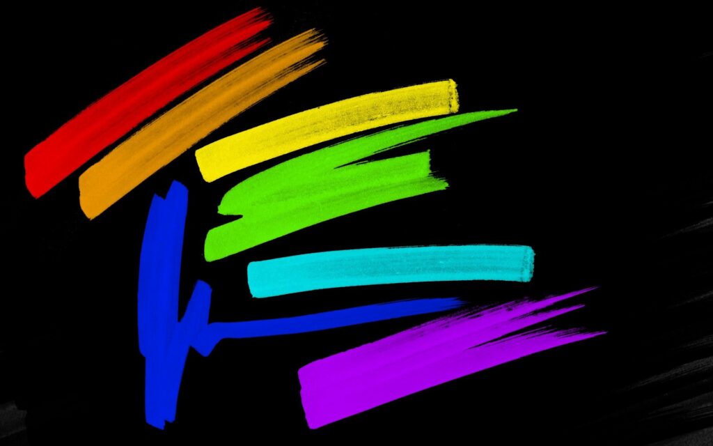 Vibrant Multi-Colored Brush Stroke Wallpaper on Sleek Black Background