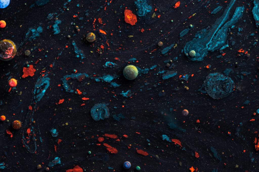 Cosmic Abstract Wallpaper: Colorful Planets & Meteorites in Space