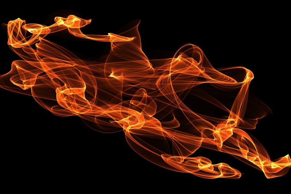 Fiery Abstract Wallpaper: Vibrant Swirls on Black Background