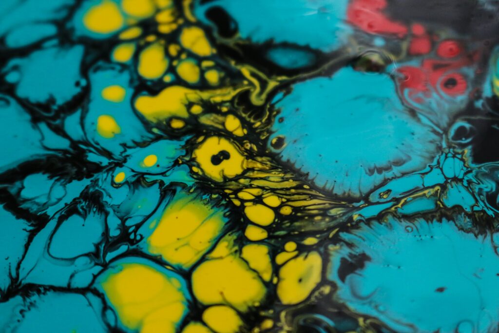 Vibrant Yellow & Turquoise Abstract Fluid Art Wallpaper Background
