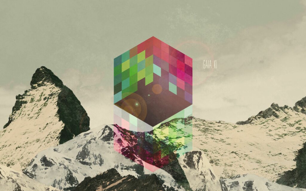 Colorful Geometric Cube Wallpaper with Snow-Capped Mountains Background