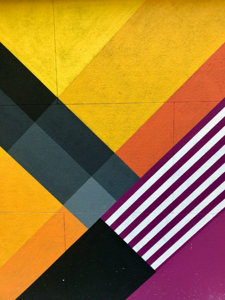 Vibrant Geometric Wallpaper: Bold Colors & Dynamic Design Background