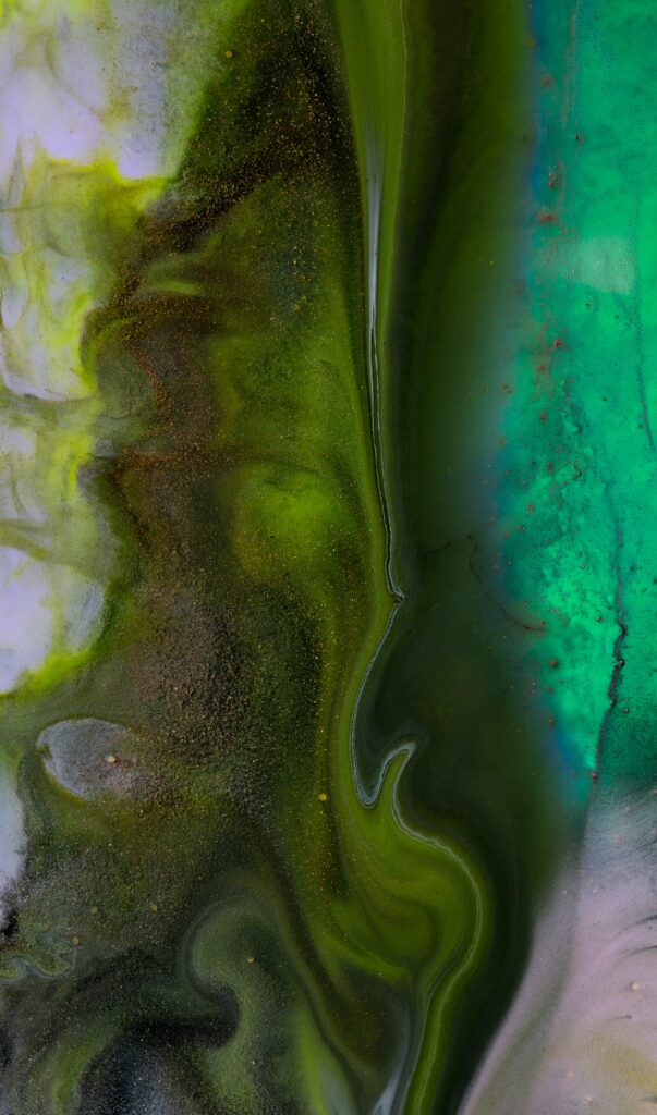 Vibrant Green Abstract Wallpaper: Fluid Paint Movement Background