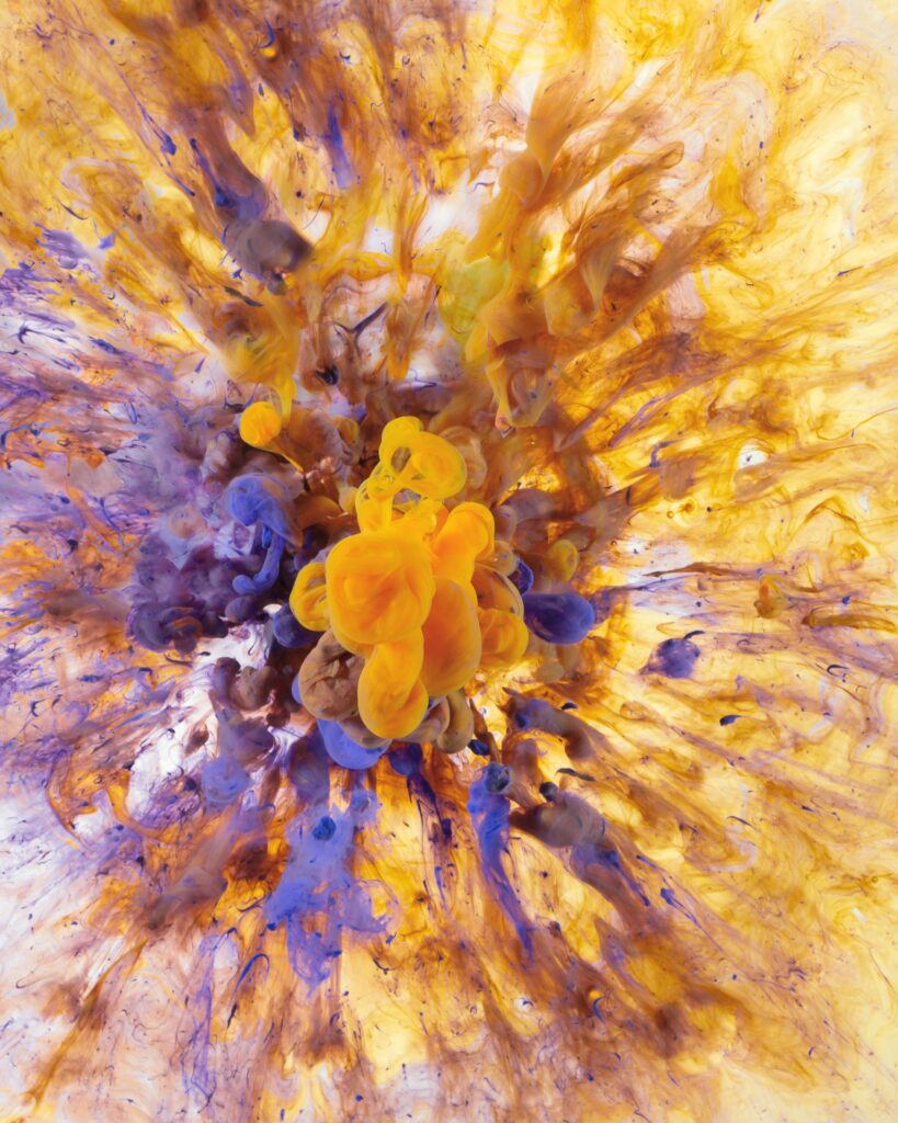 Vibrant Abstract Ink Wallpaper: Colorful Cosmic Explosion Background