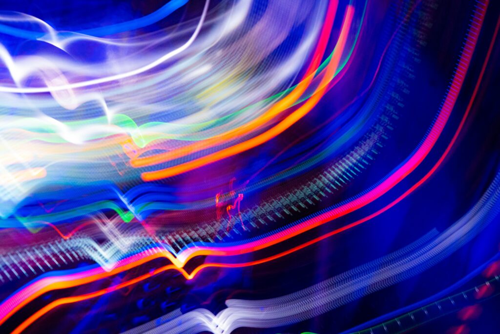 Vibrant Abstract Light Wallpaper - Dynamic Stripes & Colorful Blur