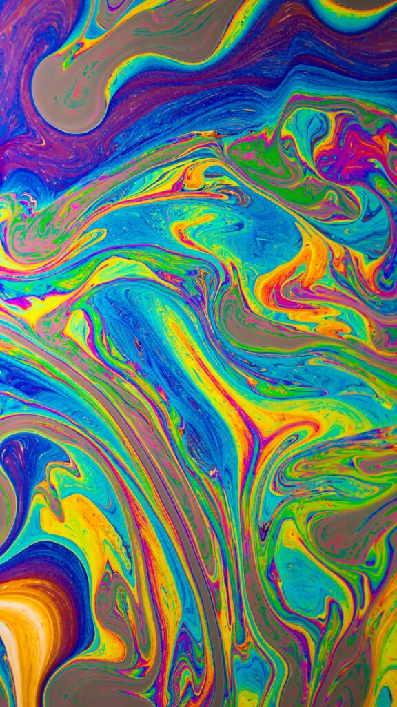 Vibrant Abstract Liquid Paint Swirls Wallpaper for Dynamic Background
