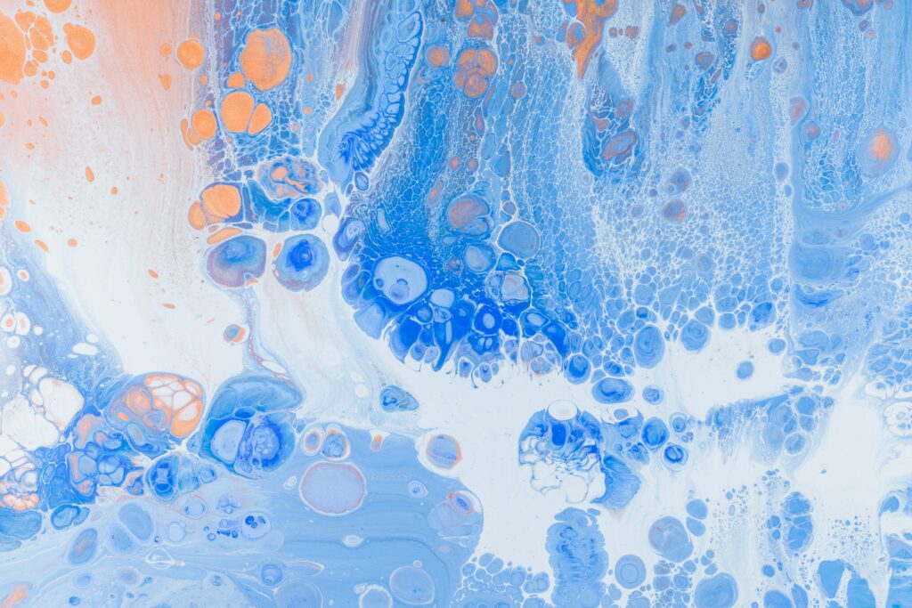 Vibrant Abstract Liquid Paint Wallpaper: Blue & Orange Design
