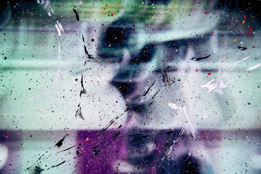 Vibrant Abstract Wallpaper with Paint Splatters in Black, White & Red