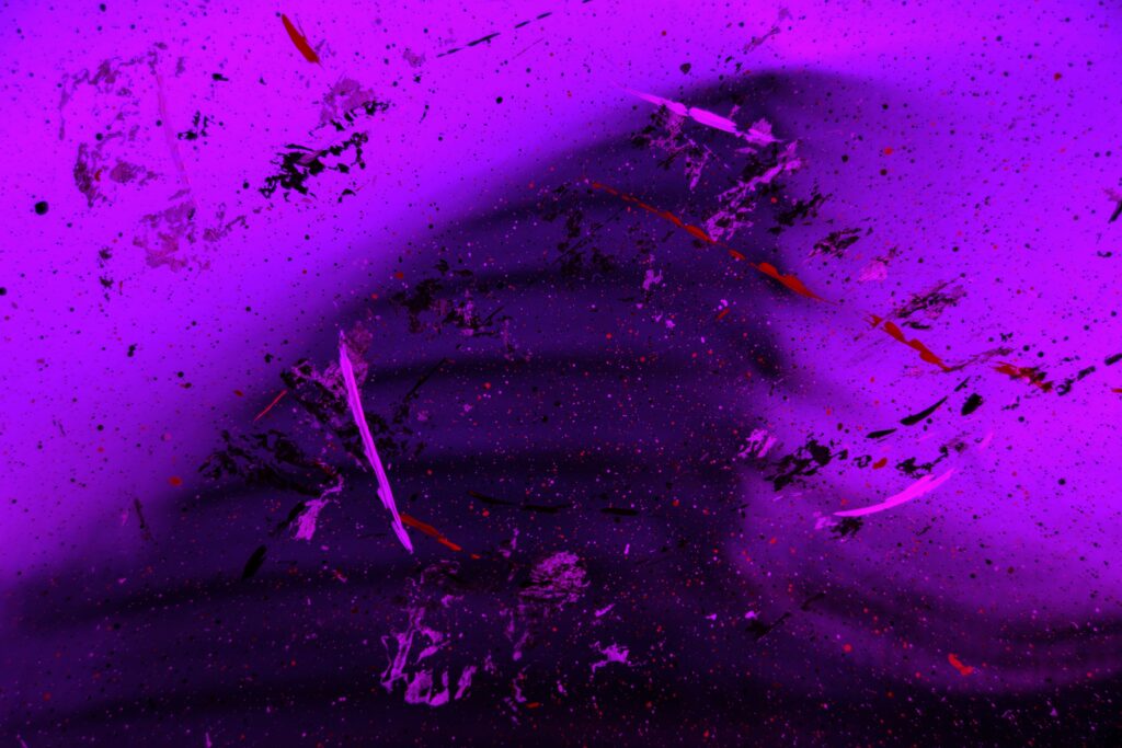 Vibrant Purple Abstract Wallpaper: Energetic Paint Splashes & Textures