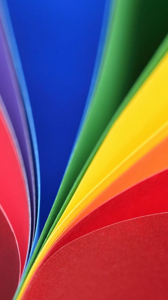 Vibrant abstract mobile wallpaper with curved rainbow paper sheets in smooth gradient layers