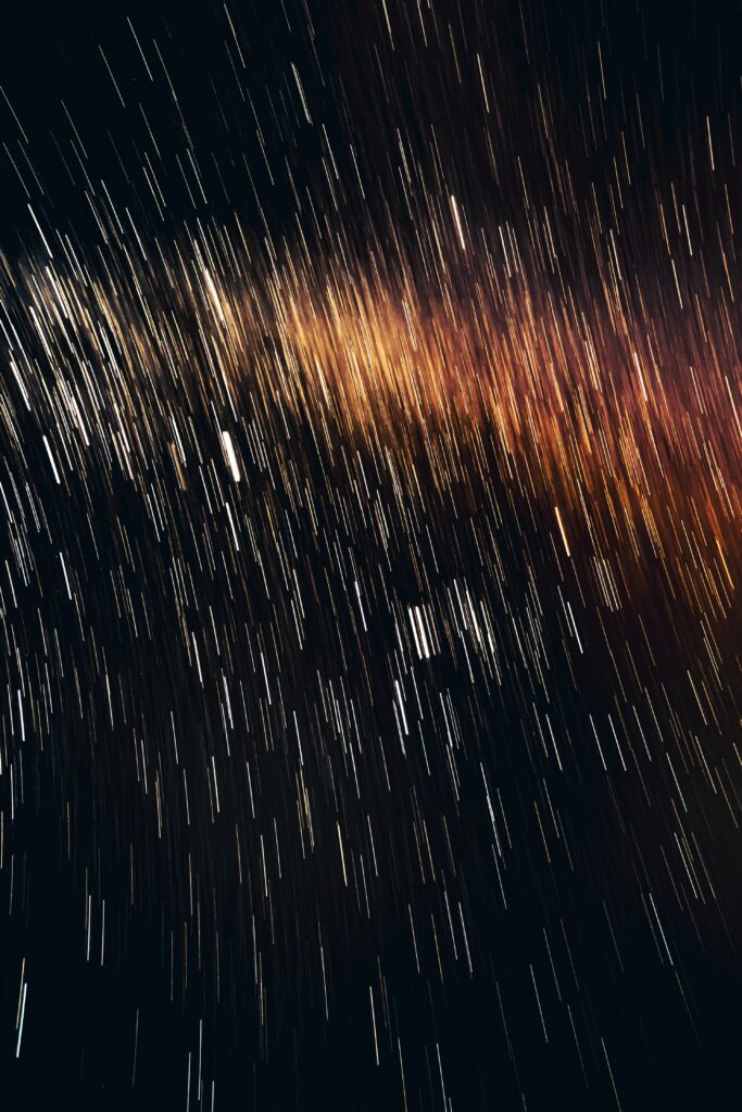 Vibrant Abstract Sparks Wallpaper: Dynamic Light & Flowing Motion