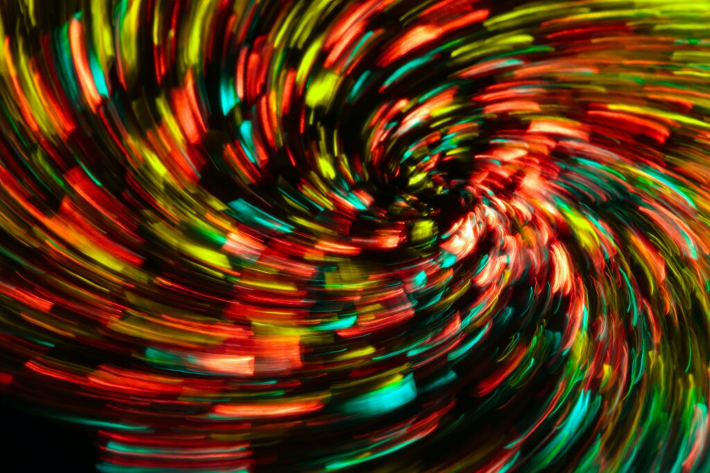 Vibrant Abstract Spiral Wallpaper: Dynamic Colorful Lights Background