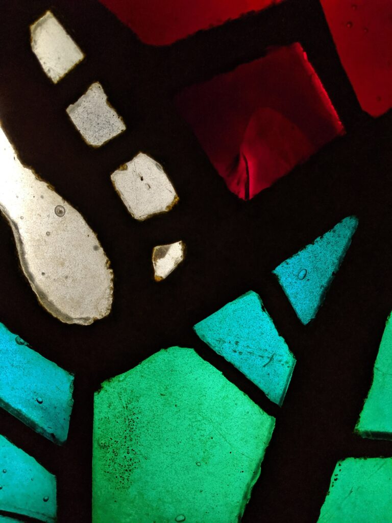 Vibrant Abstract Stained Glass Wallpaper with Multicolored Design