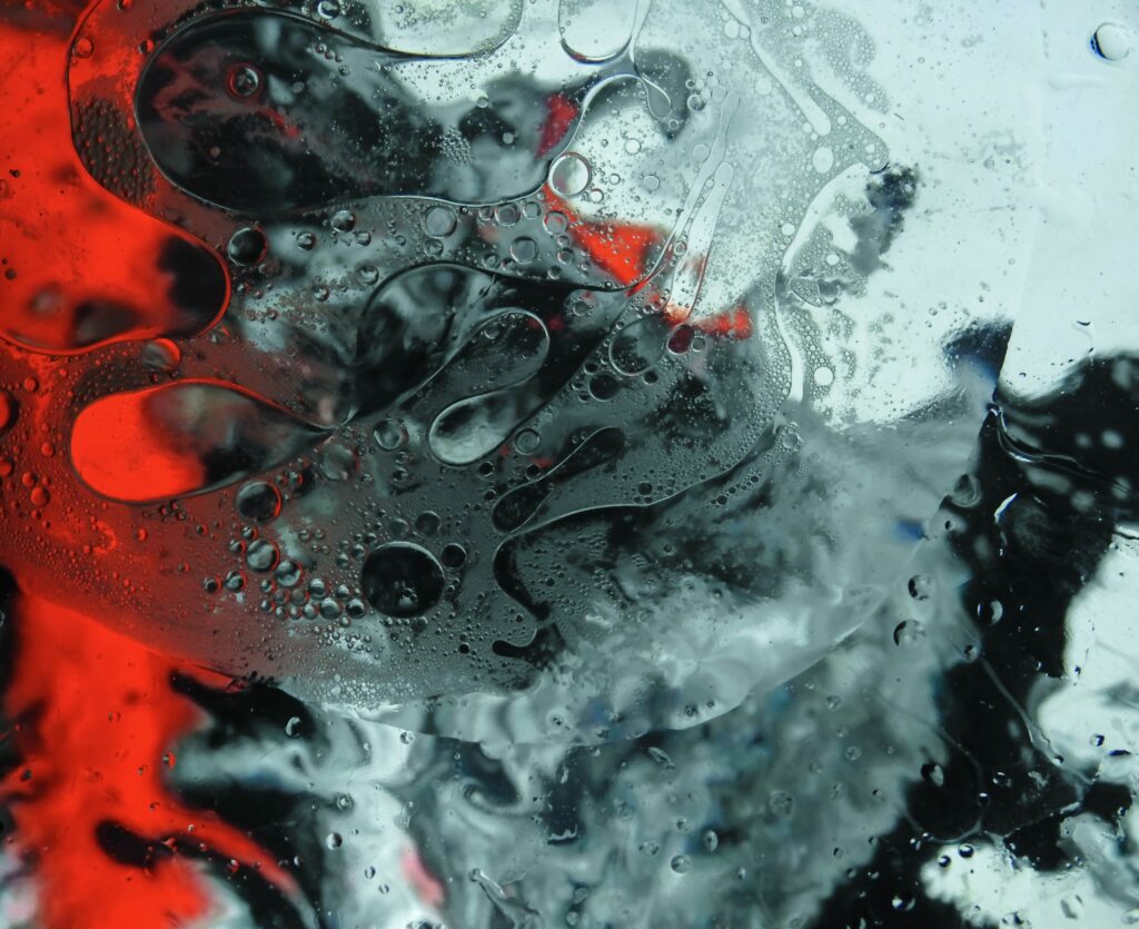 Mesmerizing Abstract Wallpaper with Fluid Patterns in Red & Black