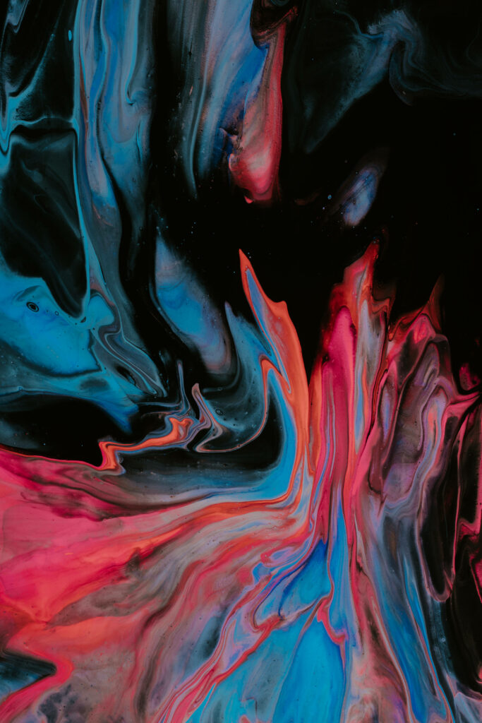 Vibrant Abstract Wallpaper: Blue, Red & Pink on Black Background