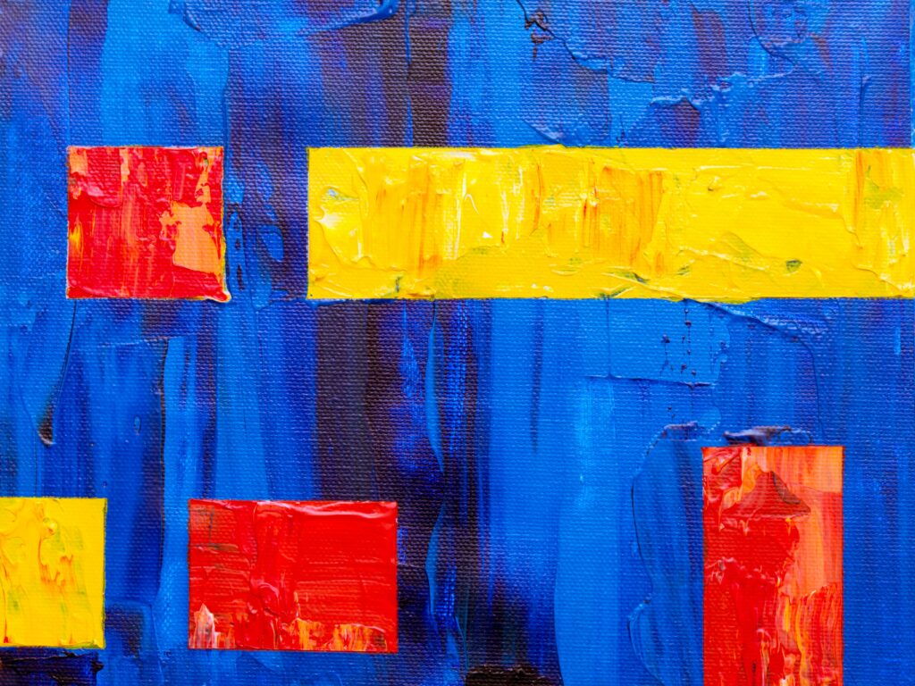 Vibrant Abstract Canvas Wallpaper: Bold Blue, Red & Yellow Dynamics
