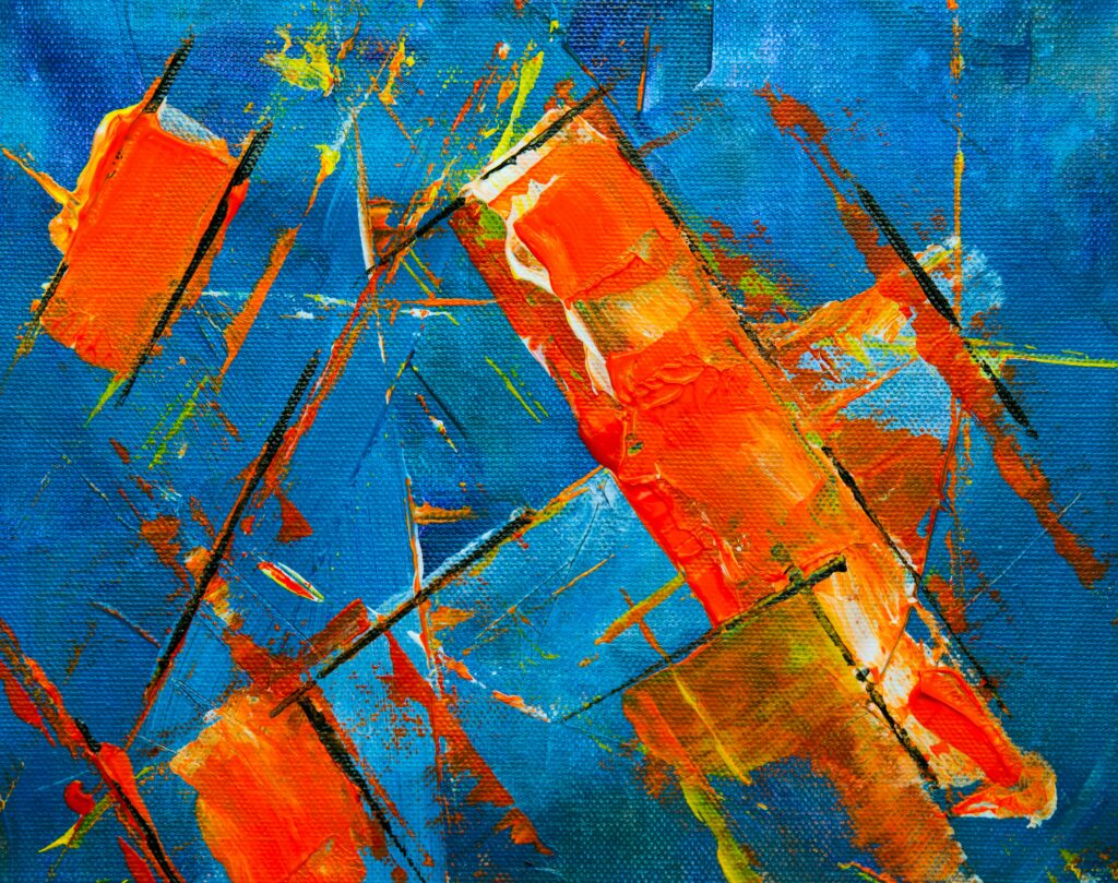 Vibrant Abstract Wallpaper: Bold Orange & Yellow on Blue Canvas