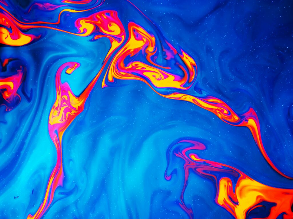 Vibrant Abstract Swirling Wallpaper in Bold Blue, Orange & Pink