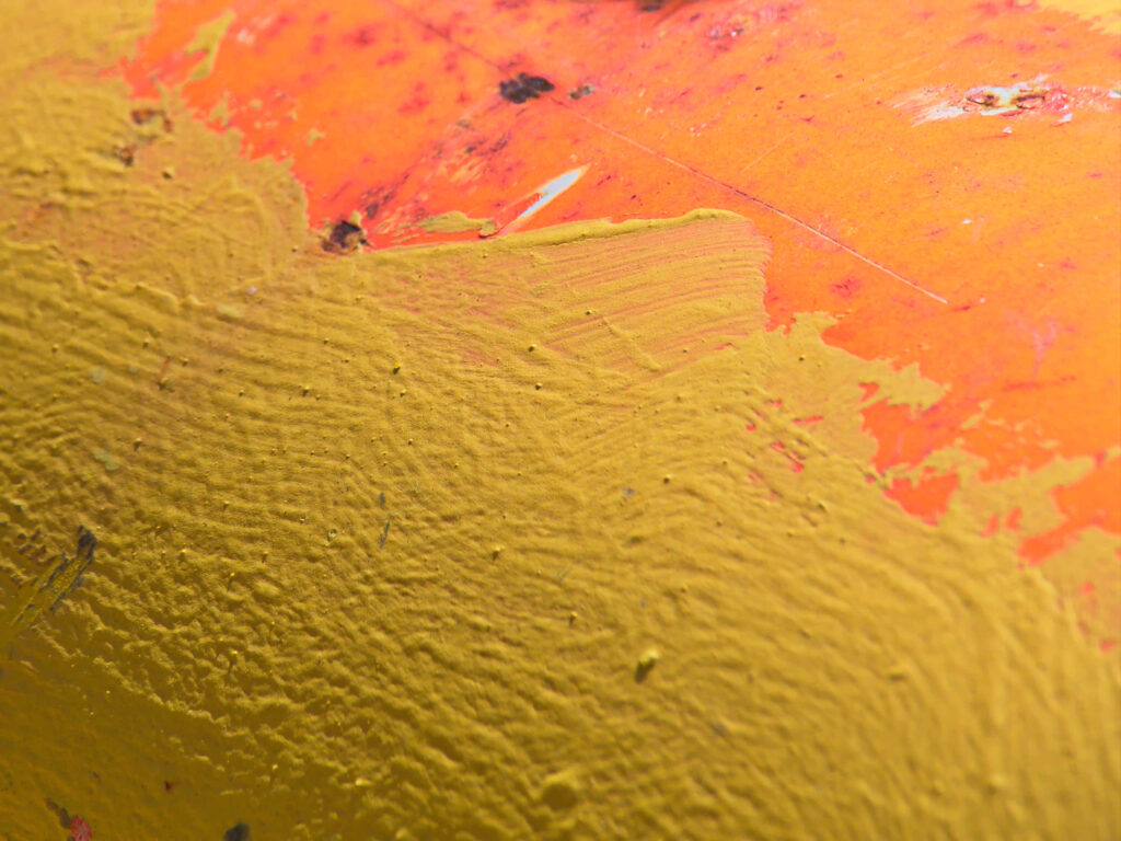 Vibrant Yellow Abstract Wallpaper on Textured Orange Background