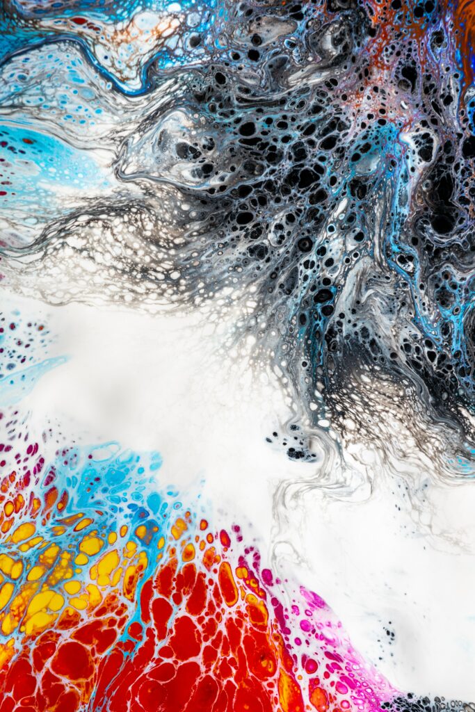 Vibrant Abstract Paint Mixing Wallpaper: Colorful Dynamic Textures