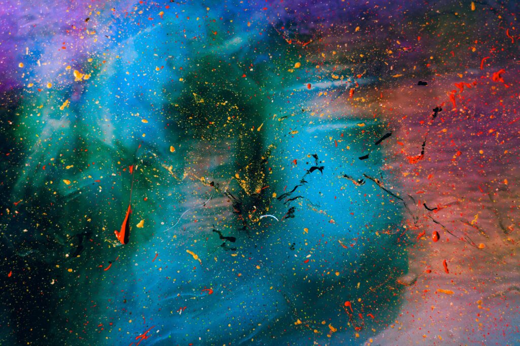 Vibrant Abstract Background: Colorful Splatters on Glass Surface Wallpaper