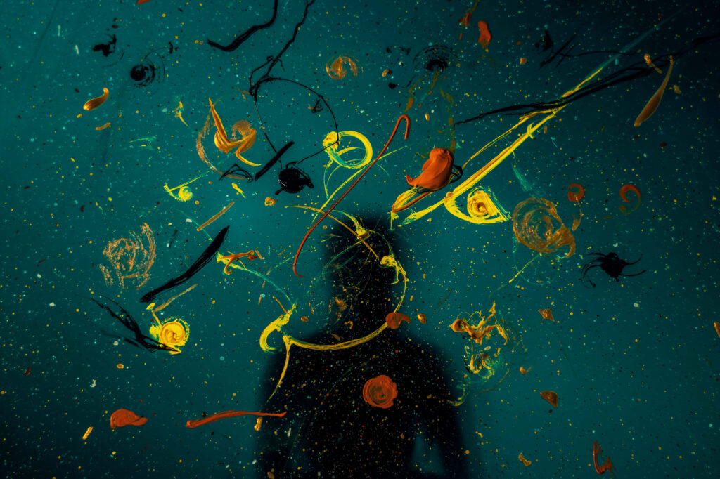 Vibrant Dark Background Wallpaper with Yellow & Orange Splashes
