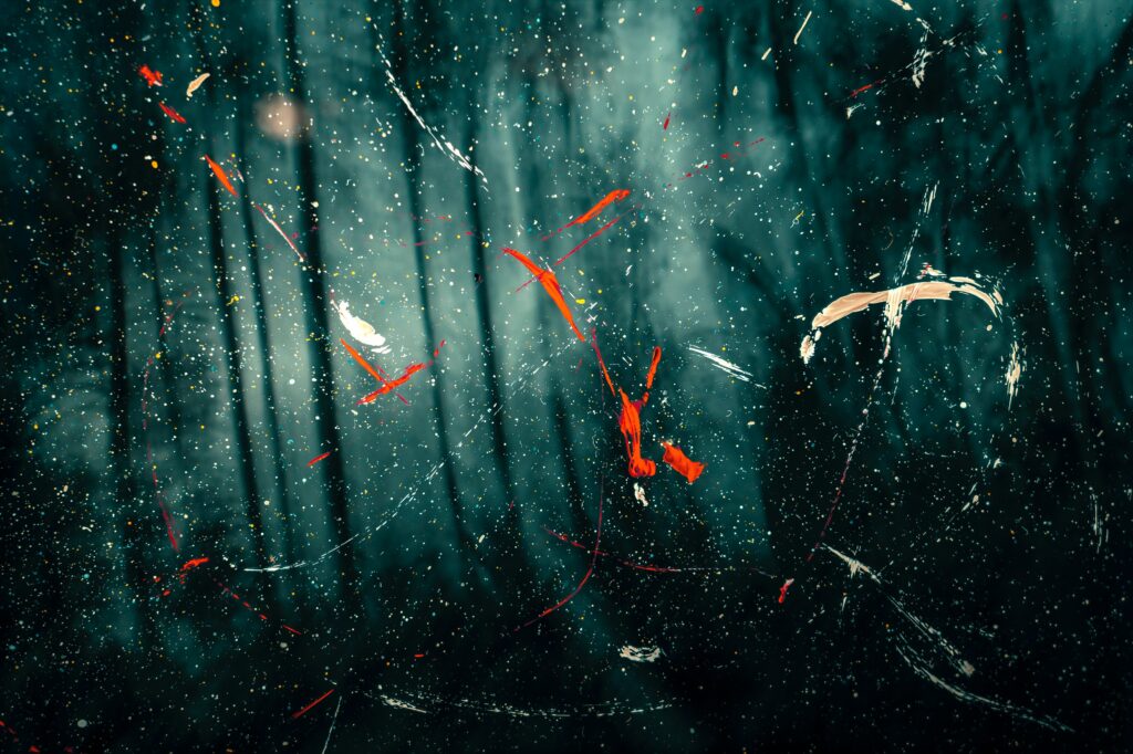 Abstract Dark Forest Wallpaper with Vibrant Paint Splashes - High Res