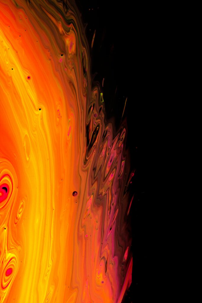 Vibrant Abstract Wallpaper: Fiery Paint Swirls on Dark Background