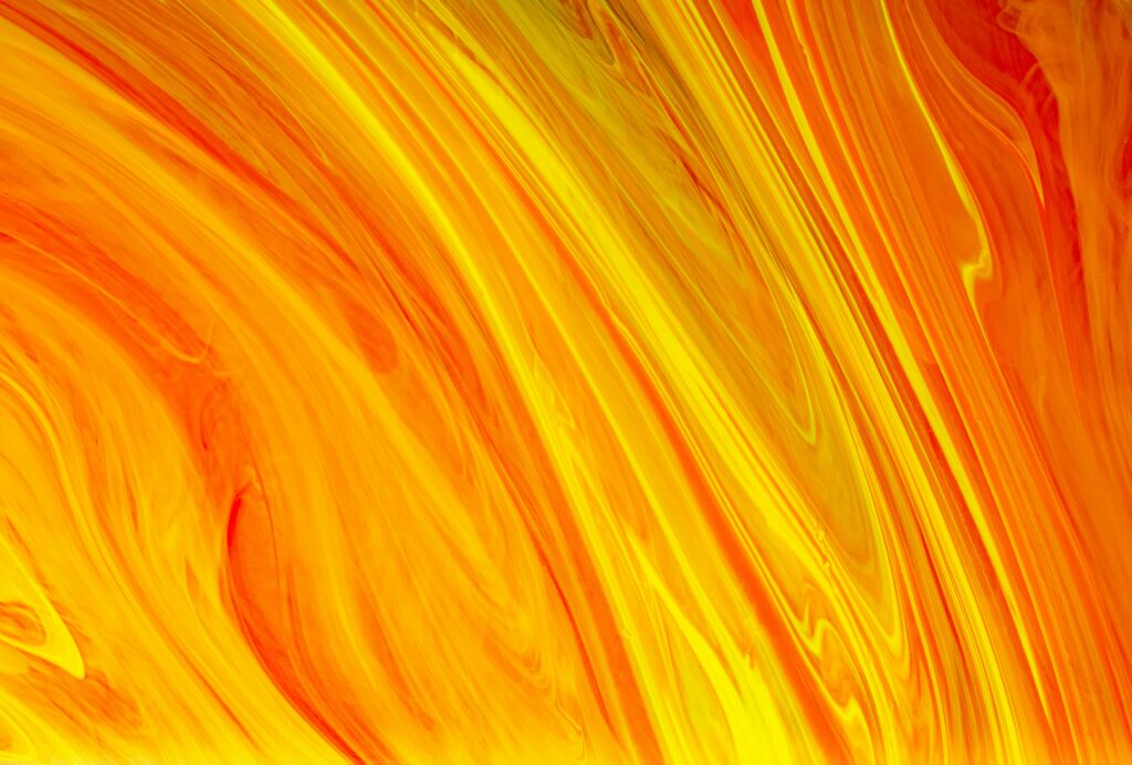 Vibrant Abstract Wallpaper: Warm Yellow & Orange Flowing Patterns