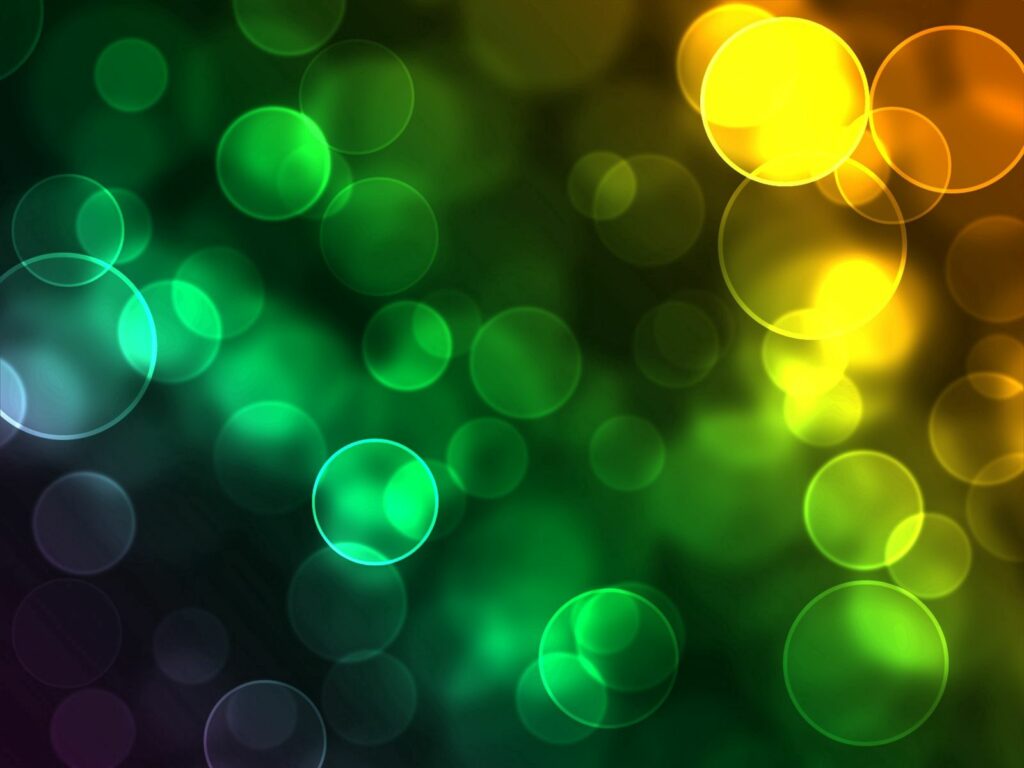 Vibrant Abstract Wallpaper: Glowing Circles in Green & Yellow