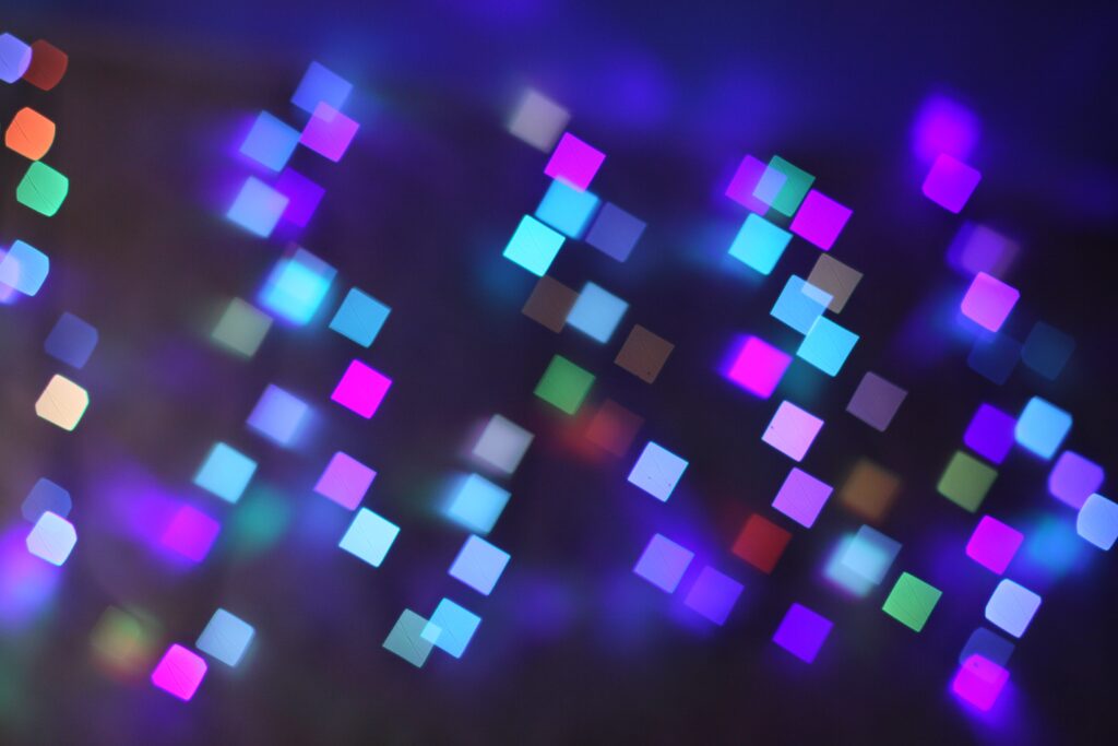 Vibrant Abstract Wallpaper: Glowing Multicolored Squares Background