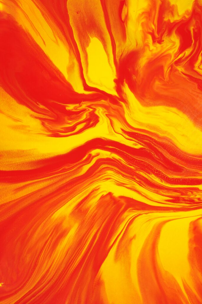 Vibrant Abstract Wallpaper with Flowing Red and Yellow Patterns