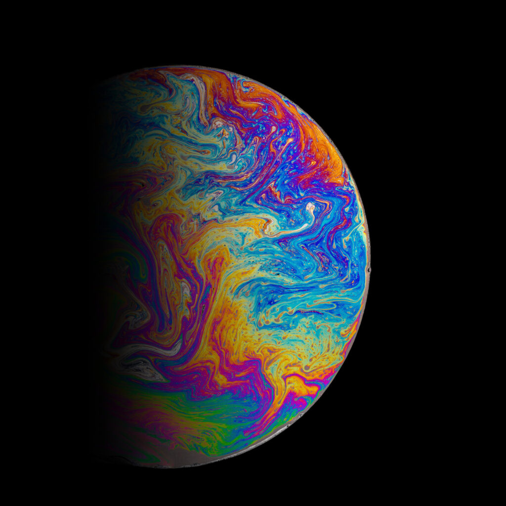 Vibrant Abstract Wallpaper: Spherical Object in Multicolored Swirls