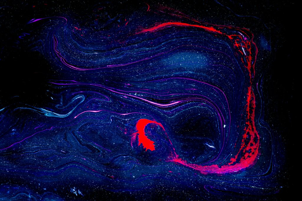 Dynamic Abstract Wallpaper: Swirling Blues, Reds & Glittering Accents