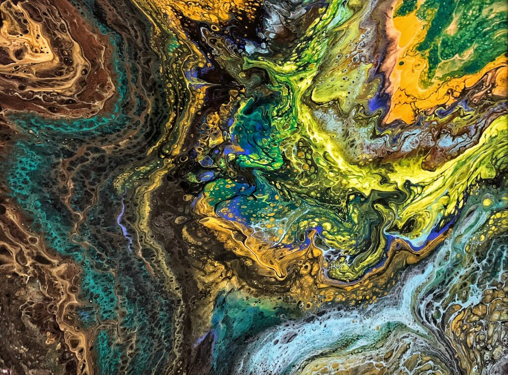 Vibrant Abstract Wallpaper with Swirling Liquid Stains Design