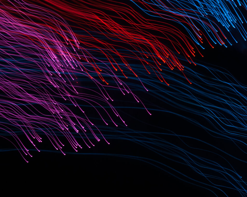 Vibrant Abstract Wallpaper: Wavy Lines in Red, Pink & Blue