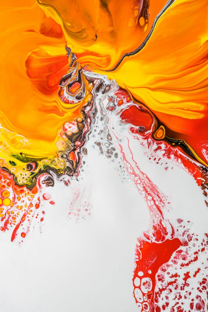 Vibrant Abstract Wallpaper with Fluid Paint Patterns in Bold Colors