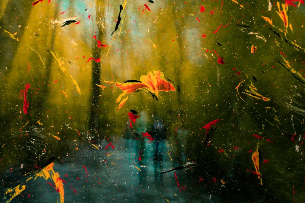 Vibrant Abstract Wallpaper: Expressive Strokes on Glass Surface