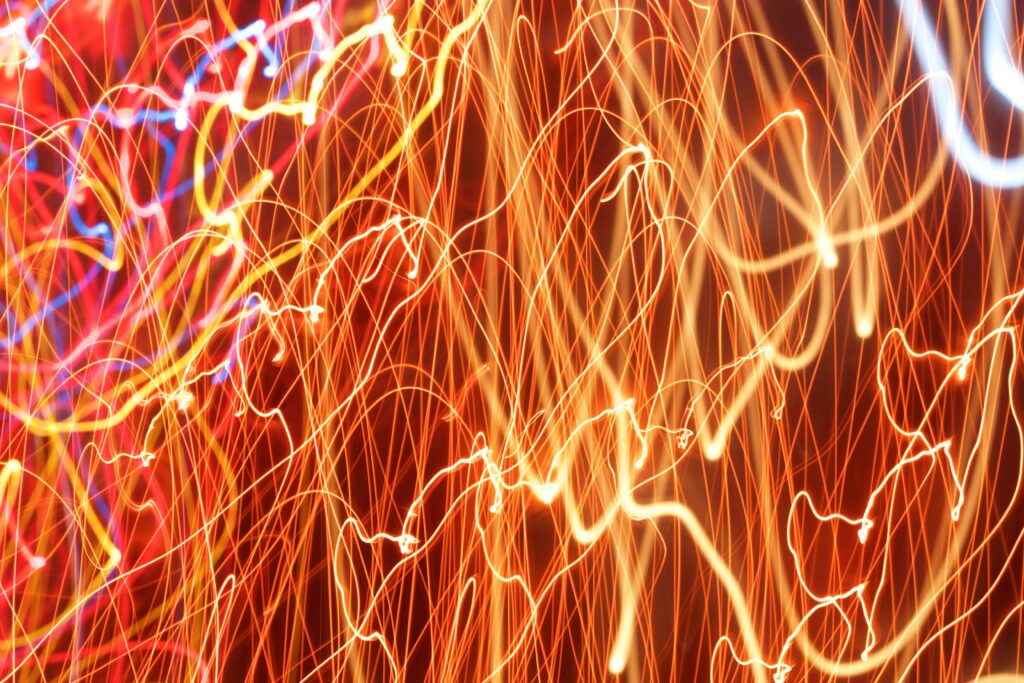 Vibrant Abstract Wallpaper: Glowing Lines & Light Trails Background