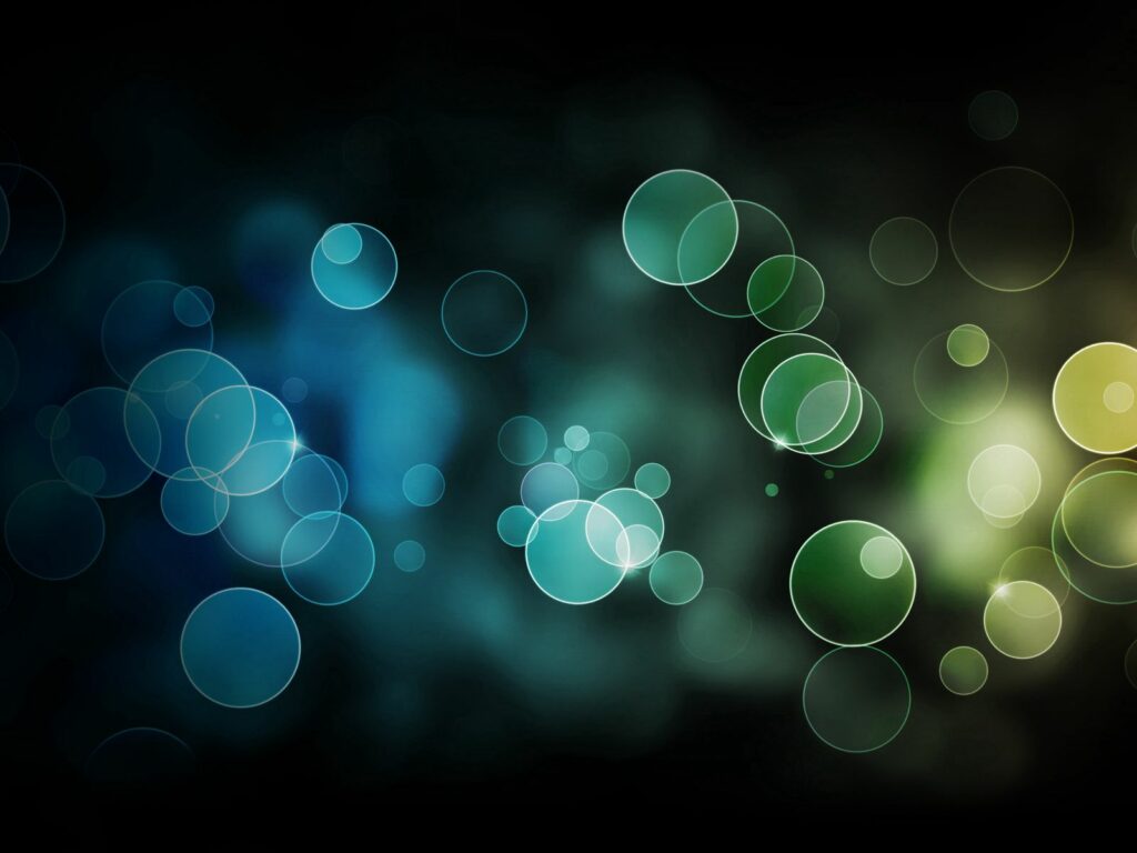 Vibrant Multicolored Glowing Circles Abstract Wallpaper Background