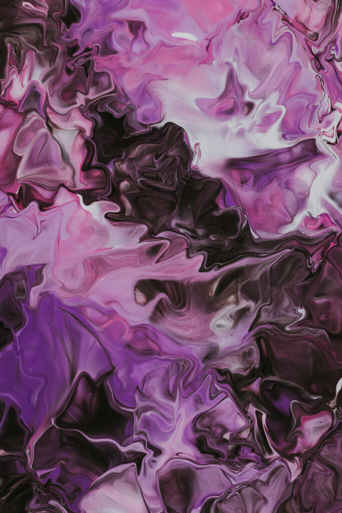 Vibrant Abstract Wallpaper: Swirling Macro Paint Stains Background