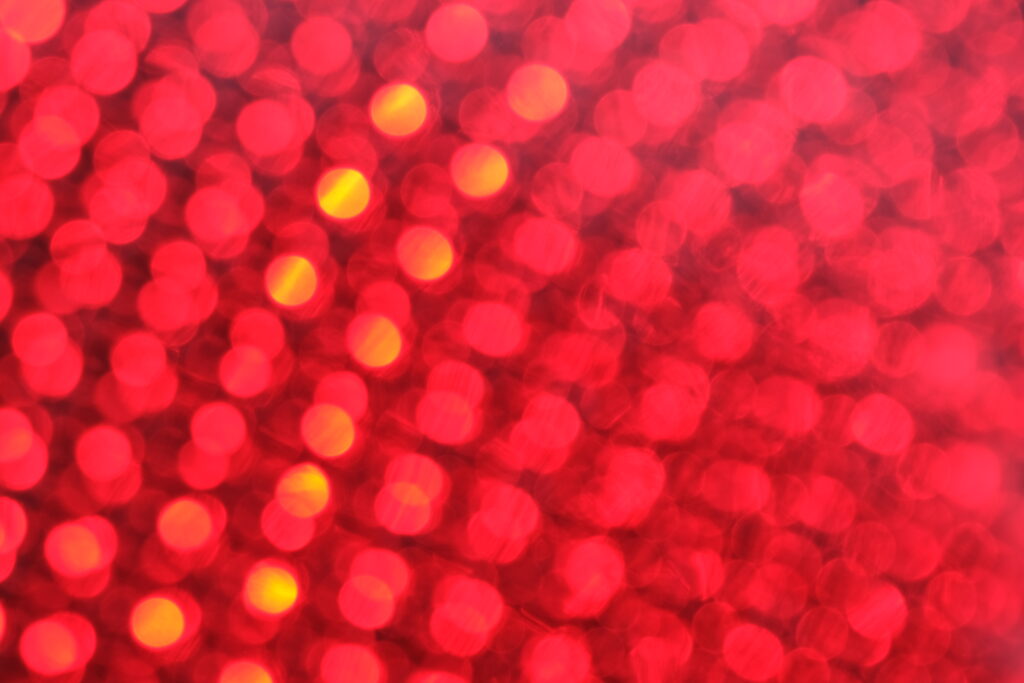 Vibrant Red Bokeh Circles Abstract Wallpaper Background Design