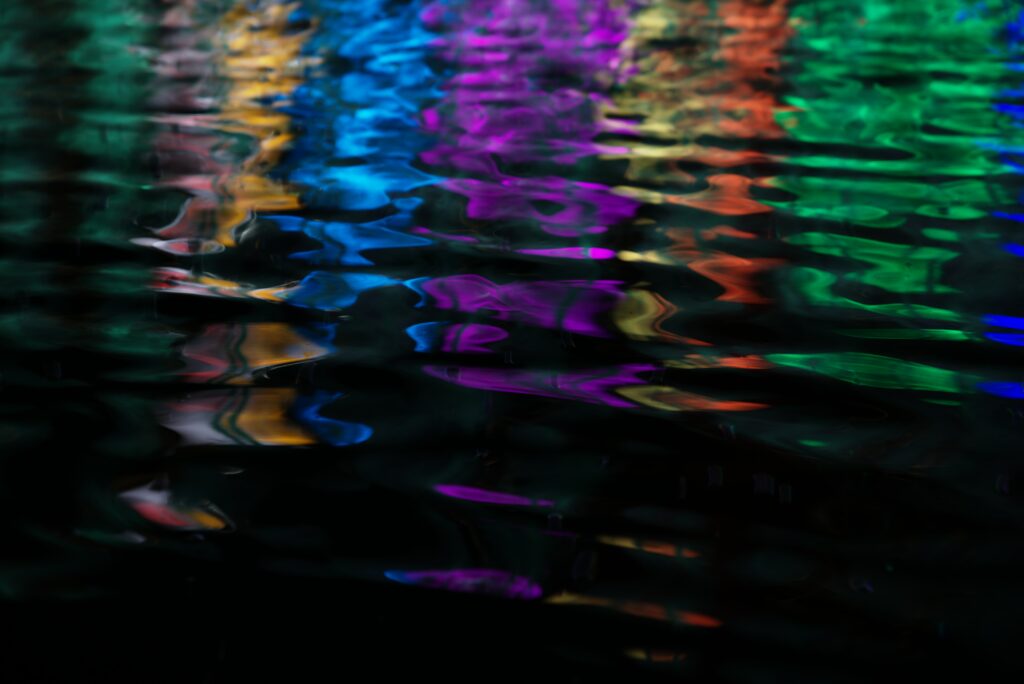 Vibrant Abstract Wallpaper: Mesmerizing Multi-Colored Ripples