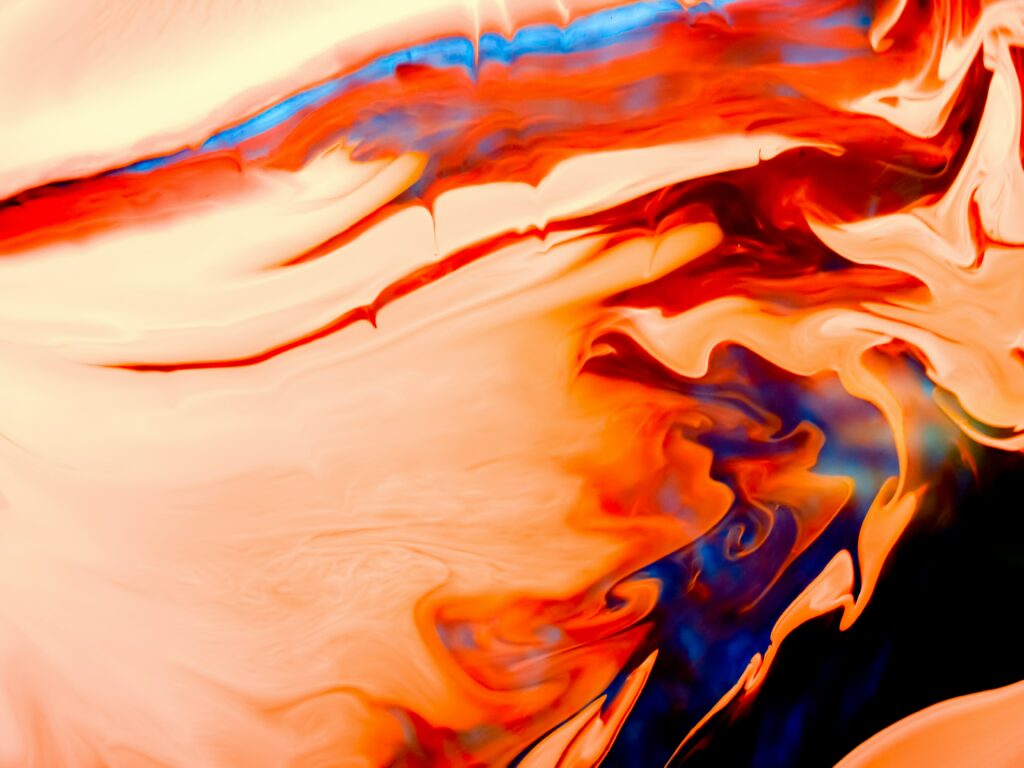 Vibrant Abstract Wallpaper: Swirling Red, Blue & Orange Patterns