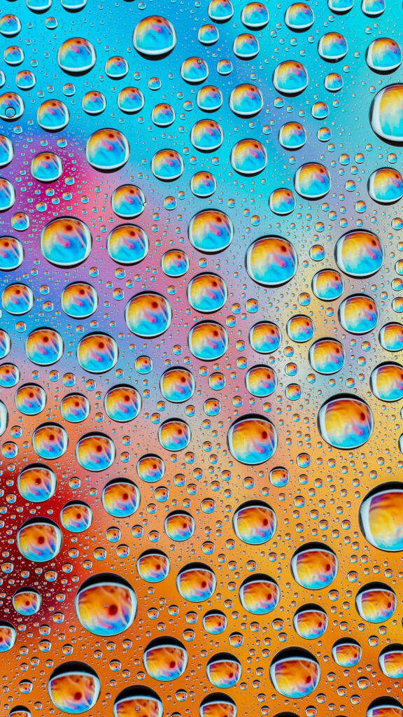 Vibrant Abstract Wallpaper: Colorful Water Droplets on Multicolored Background