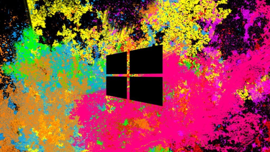 Vibrant abstract desktop wallpaper with black Windows logo and neon splatter paint background