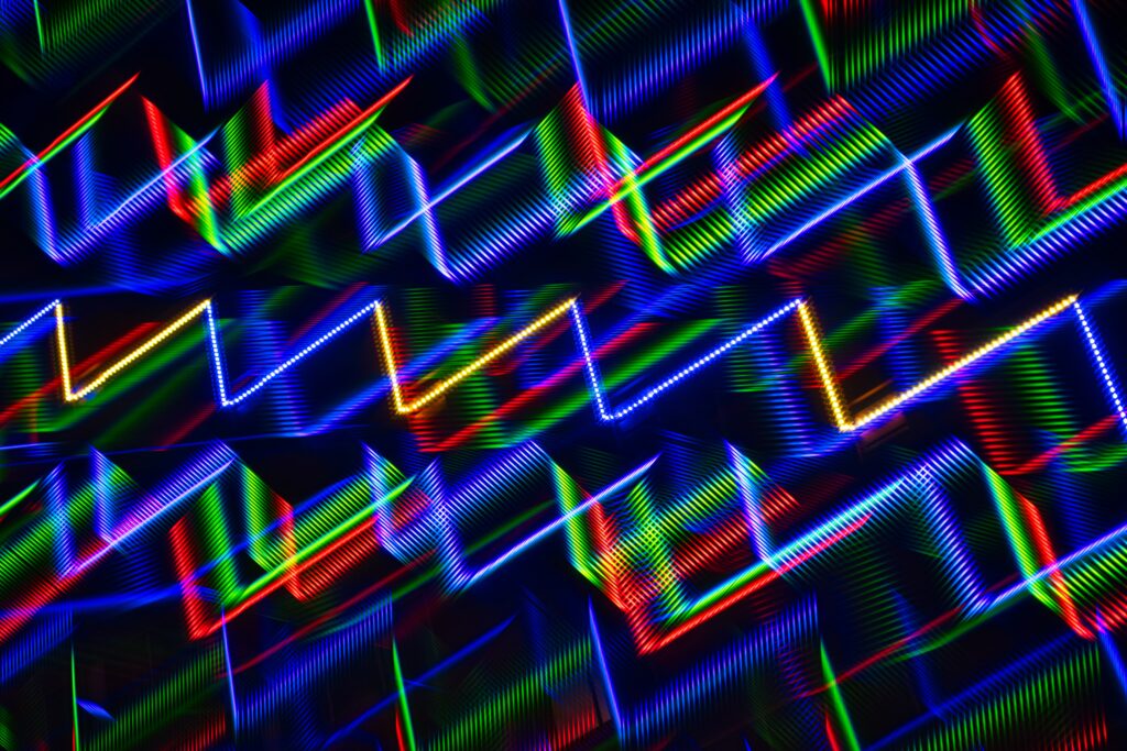 “Vibrant Abstract Zigzag Wallpaper - Colorful Dynamic Background”