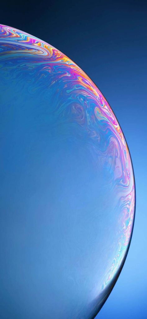 Vibrant abstract iPhone XR wallpaper with iridescent orange purple pink sphere on blue background