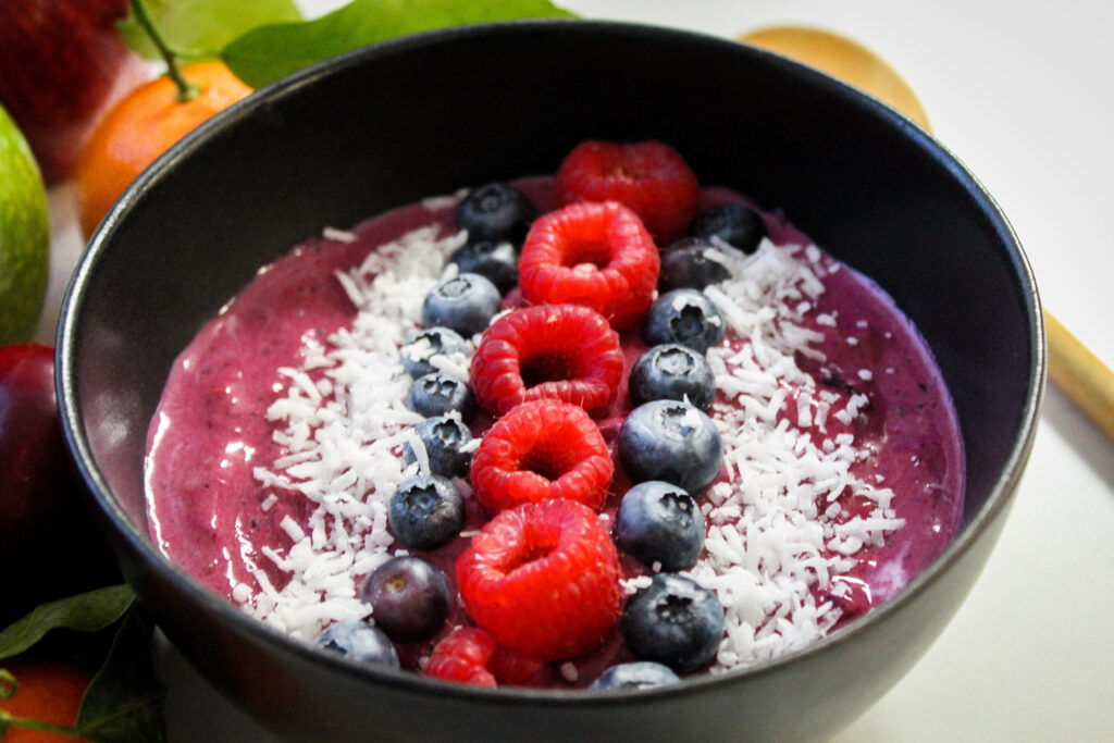 Colorful Acai Berry Bowl Wallpaper: Fresh Berries & Coconut Delight