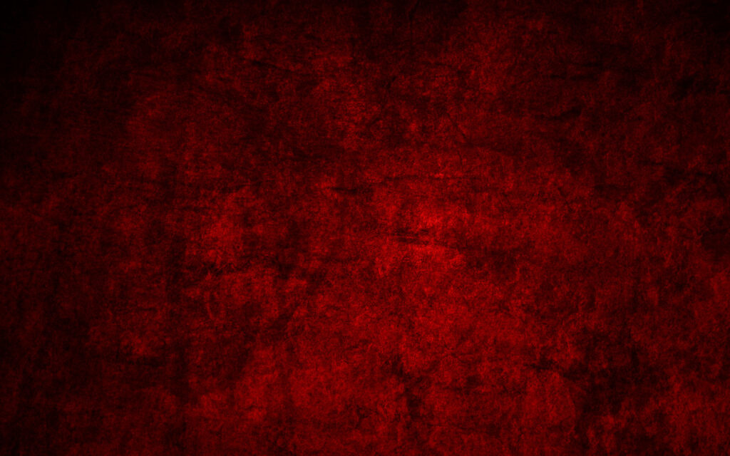 Vibrant Scarlet Splendor: Close-up of a Textured Red Stone Wall – Artistic Background Capture Wallpaper